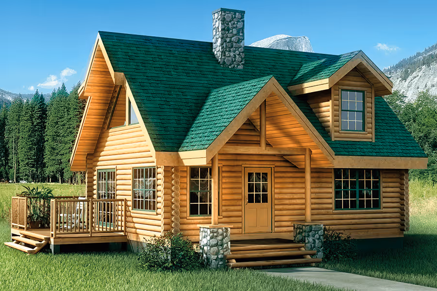 A charming wooden cabin featuring a steep green roof and stone chimney, surrounded by tall trees. The cabin has a spacious front porch with wooden railings and large windows, creating a welcoming atmosphere.