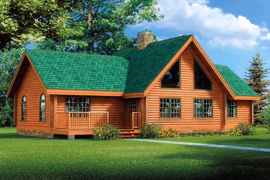 A charming wooden house with a green shingled roof and large windows surrounded by lush greenery. The structure features a welcoming porch and is set against a backdrop of tall trees and a blue sky.