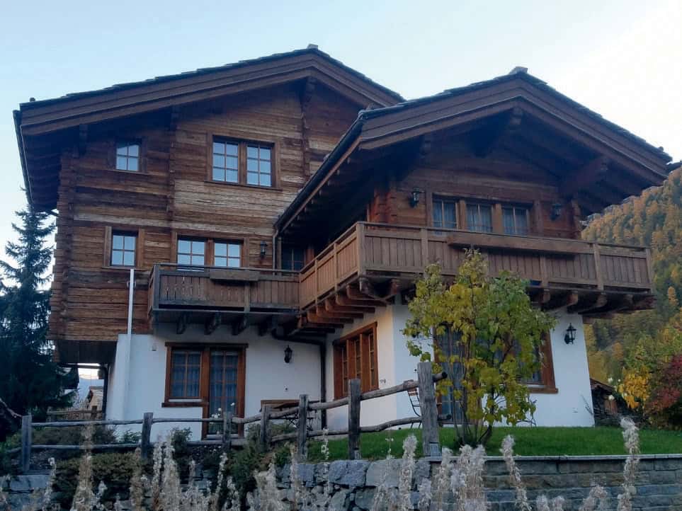 Historic log home demonstrating the long-term durability and resiliency of solid log construction